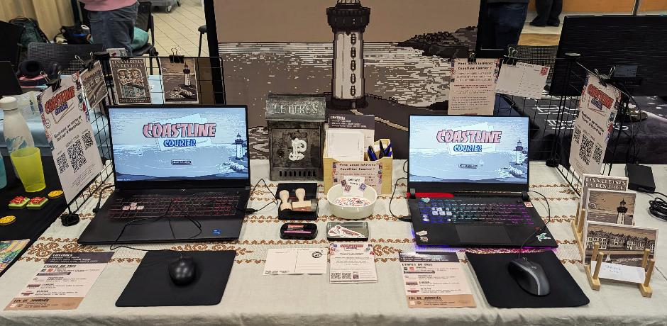 Deux personnes jouent au jeu sur le stand